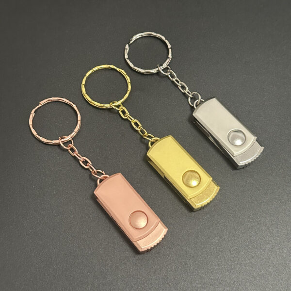 Pink gold silver metal swivel pendrive all in closed position showing keychain hole