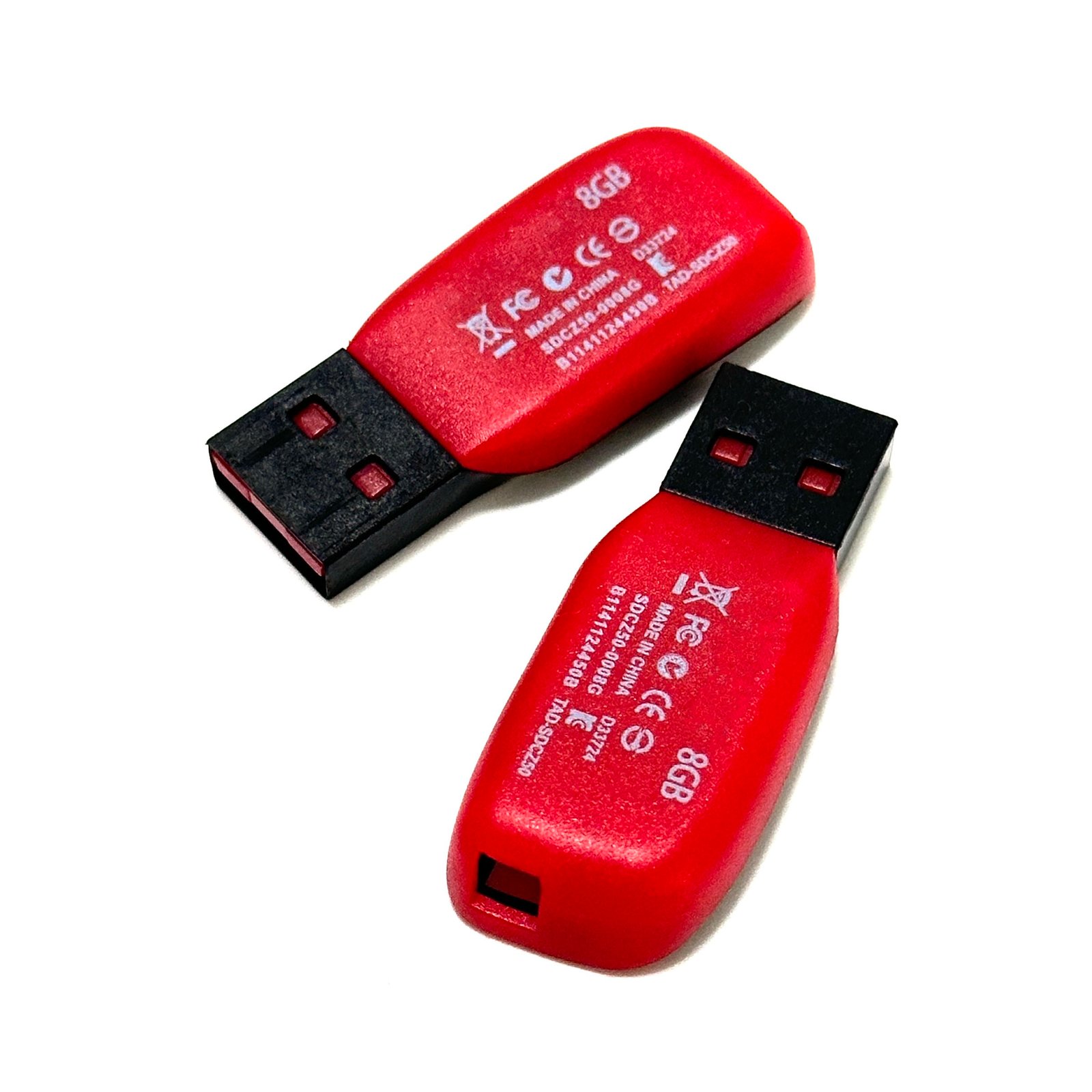 Red black USB flash drive for SanDisk Cruzer Blade connected to laptop USB port